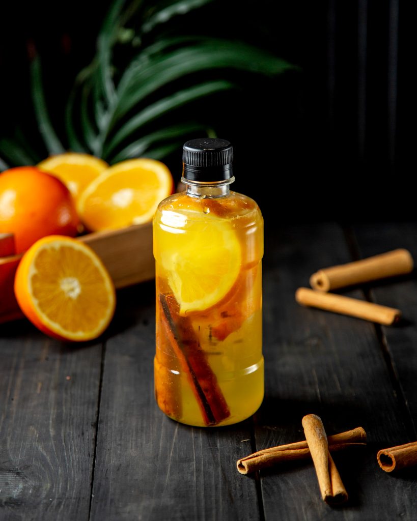 Fresh citrus perfume bottle from a homemade summer perfume collection"