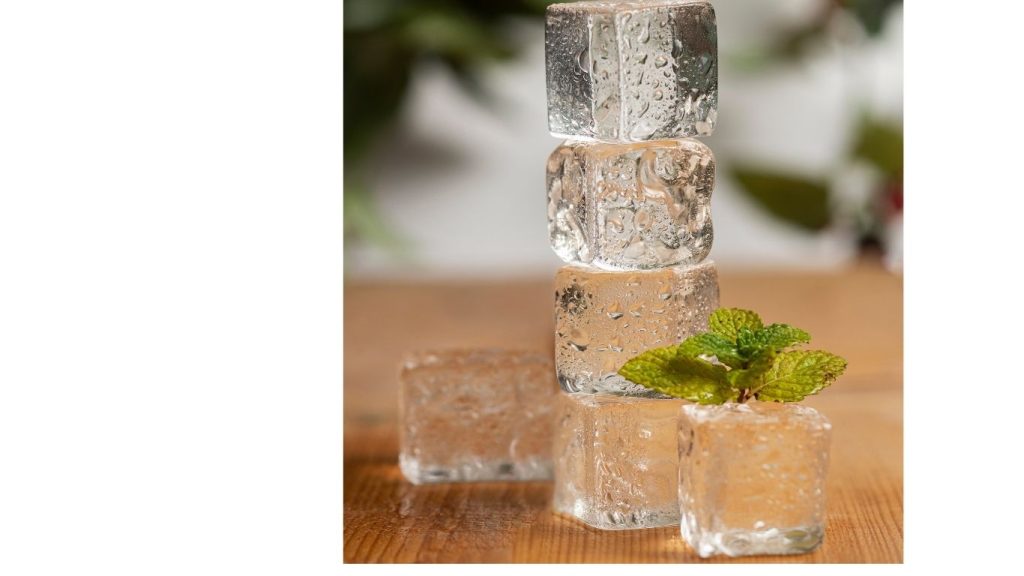 Aloe vera ice cubes neatly arranged in a row on a surface